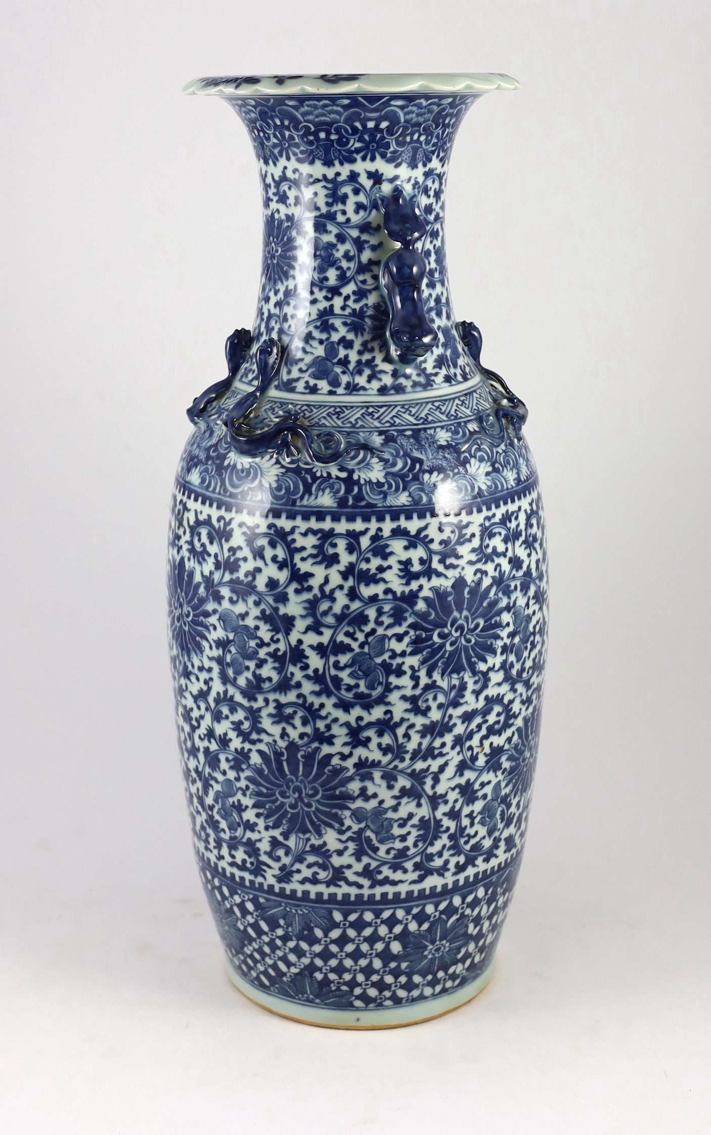 A large Chinese blue and white ‘lotus’ vase, 19th century, 59cm high, damaged